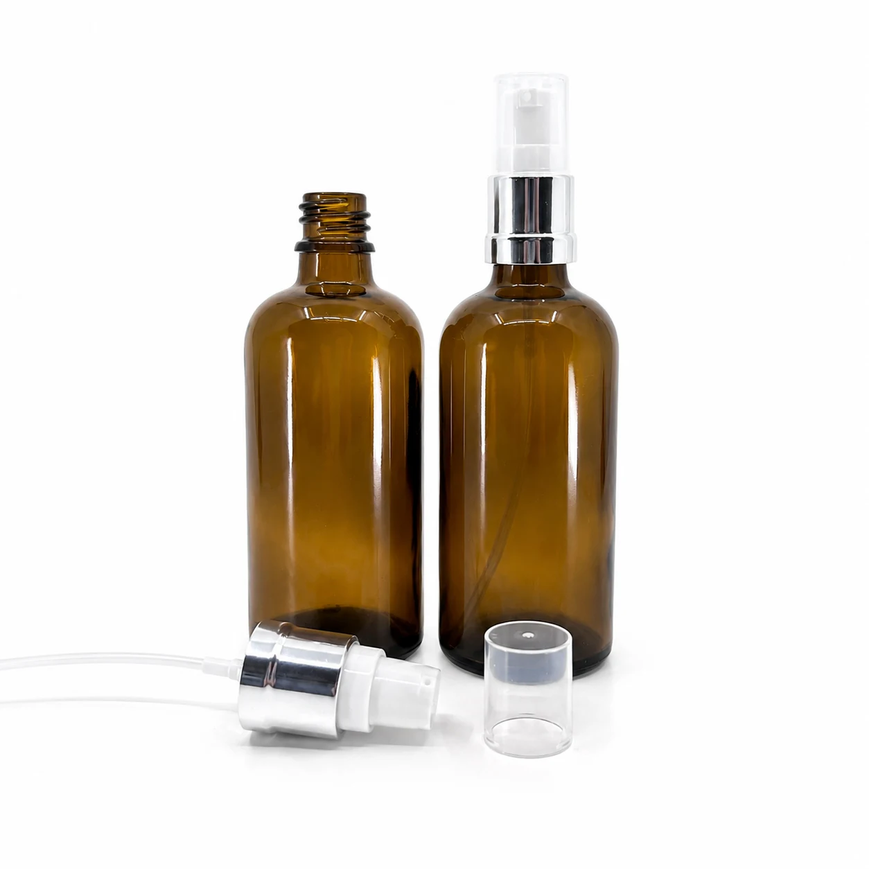 Sklenená fľaška, liekovka, hnedá, typ B, bielo-strieborný lesklý dávkovač, 100 ml