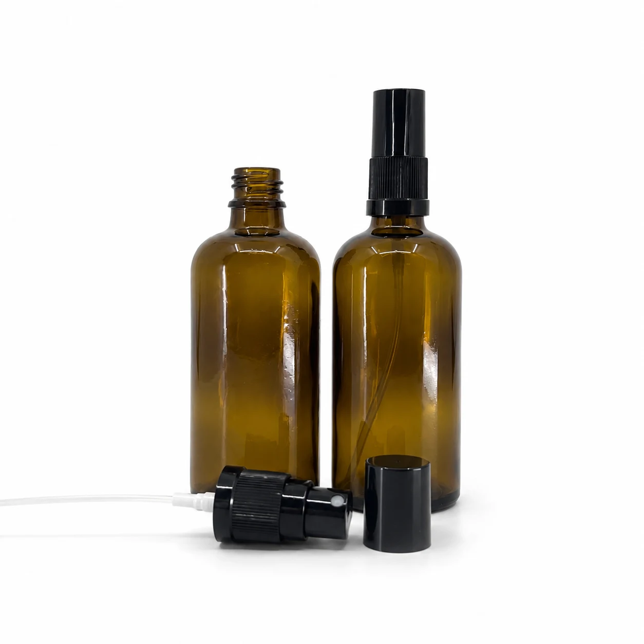 Sklenená fľaška, liekovka, typ B, čierny rozprašovač, čierny vrch, 100 ml