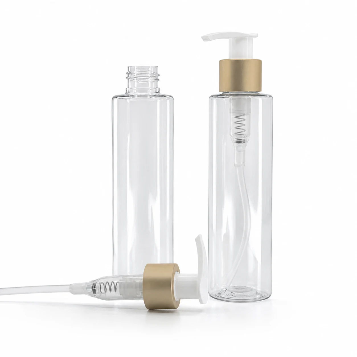 Plastová fľaša priehľadná, vysoká, bielo-zlatý matný dávkovač, 100 ml
