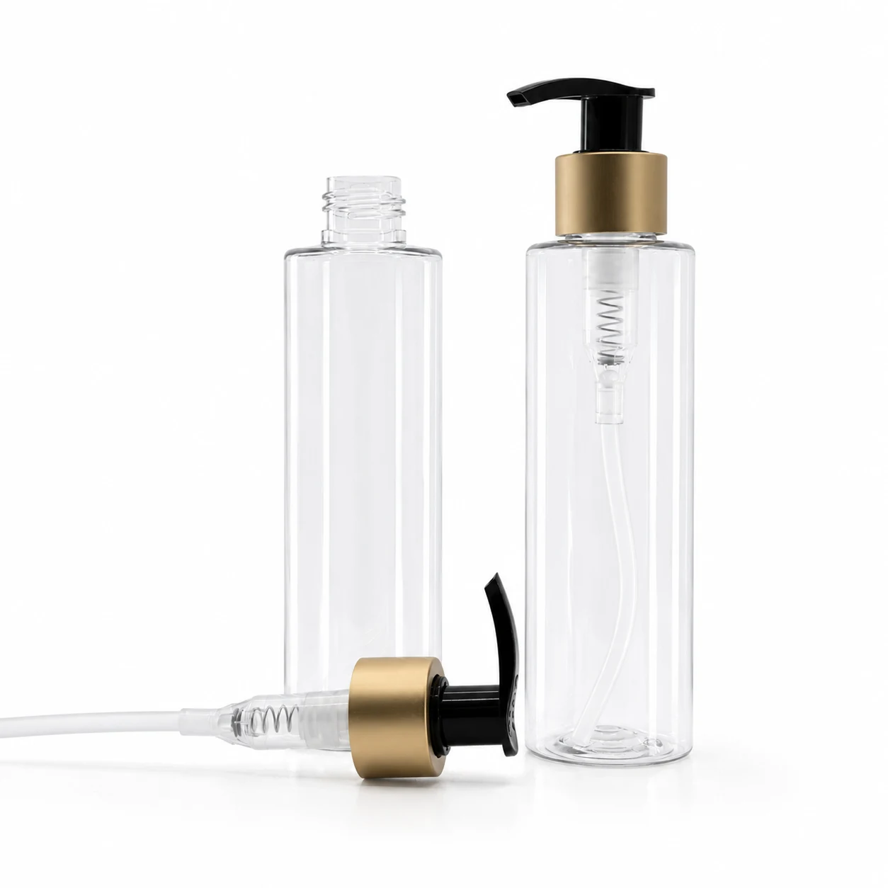 Plastová fľaša priehľadná, vysoká, čierno-zlatý matný dávkovač, 100 ml