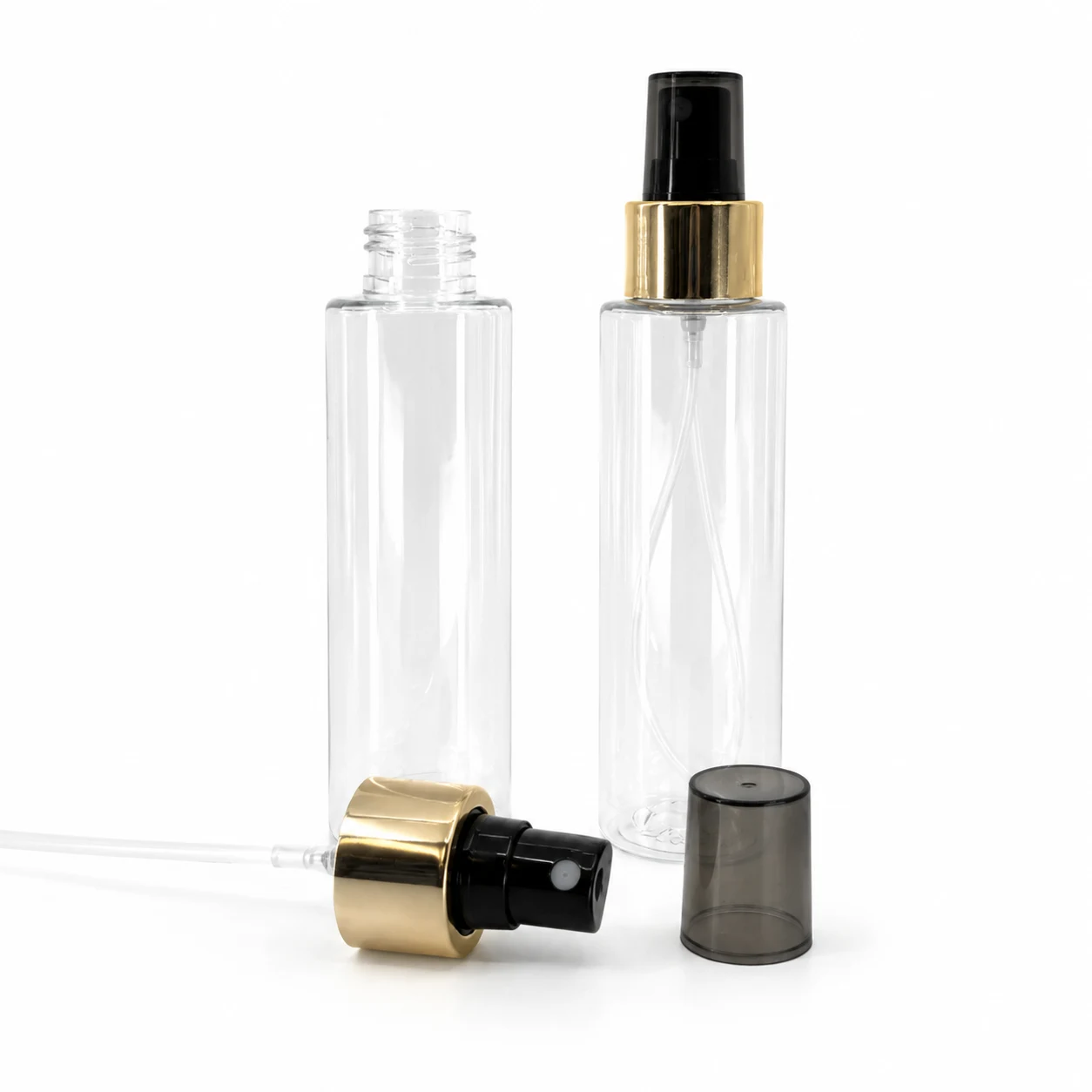 Transparente Kunststofffläschchen, schwarzer Sprühzerstäuber, goldener glänzender Ring, 100 ml