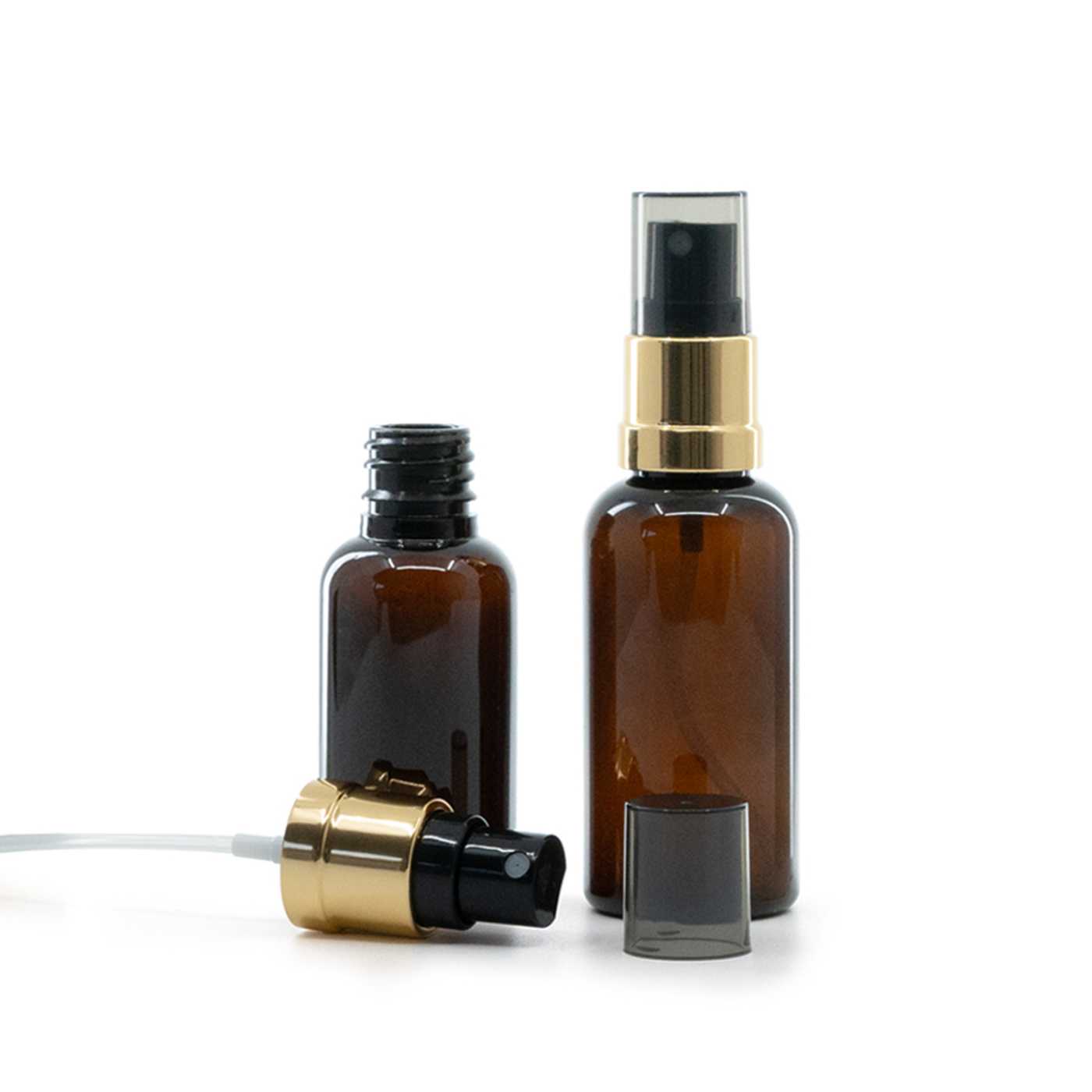 Kunststofffläschchen, schwarz-goldener Zerstäuber, rauchfarbene Überkappe, 50 ml