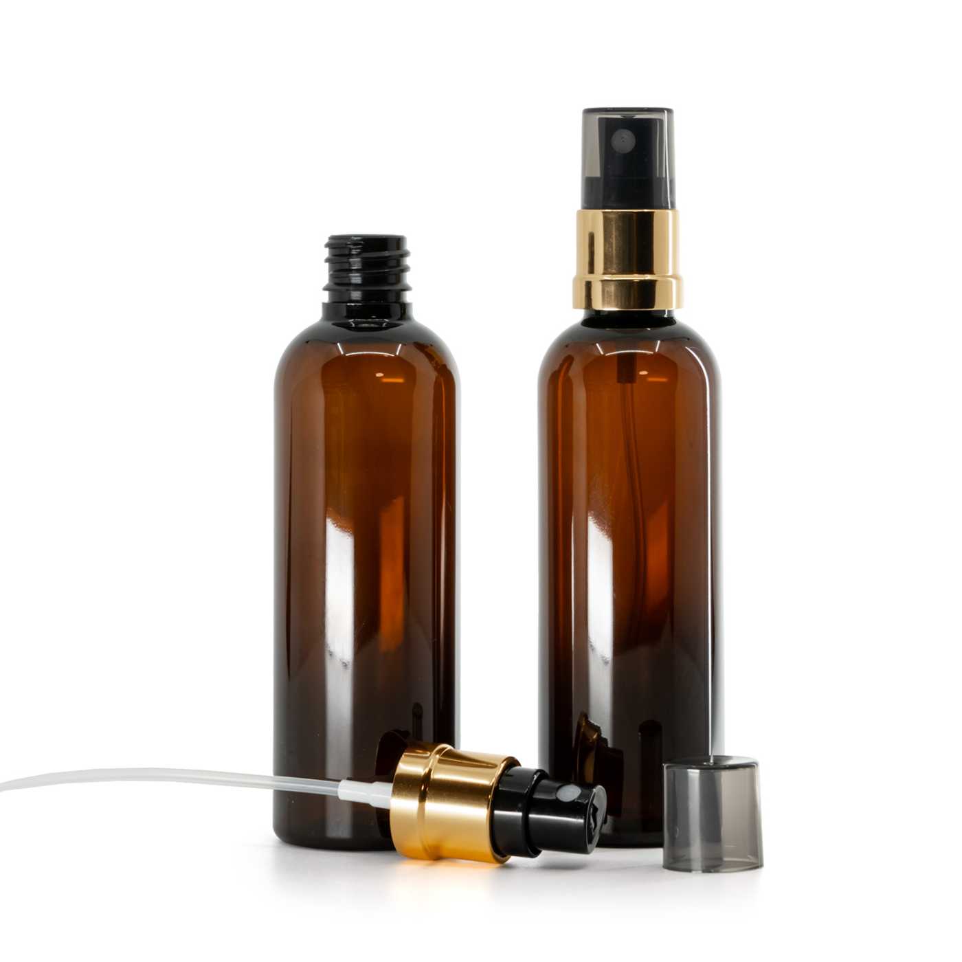 Flacon en plastique brun, spray noir et or, surcapuchon fumé, 100 ml