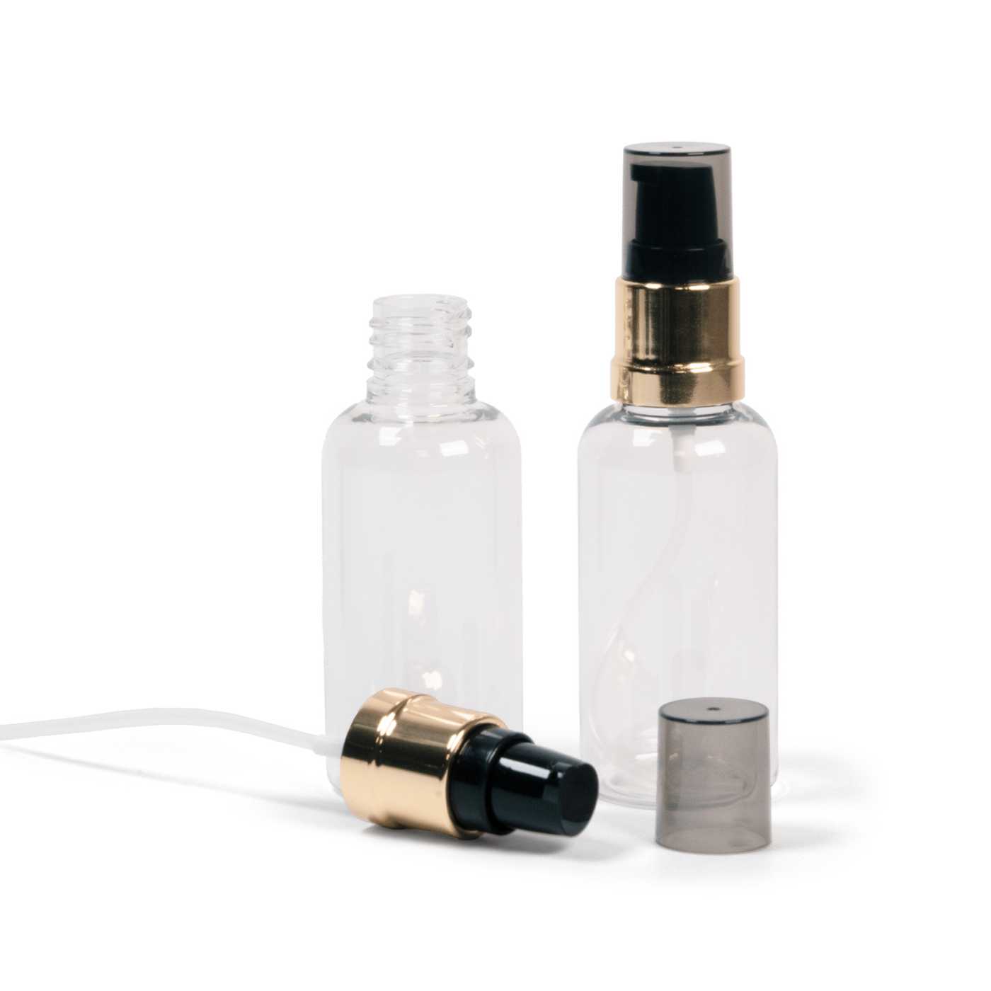 Átlátszó műanyag üvegcse, fényes fekete-arany pumpa füstös felső kupakkal, 50 ml