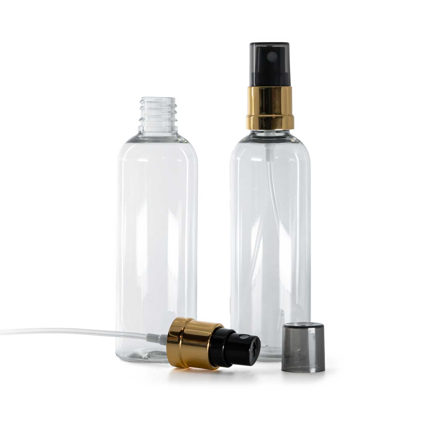 Plastová lahvička, průhledná, černo-zlatý rozprašovač, dýmový kryt, 100 ml