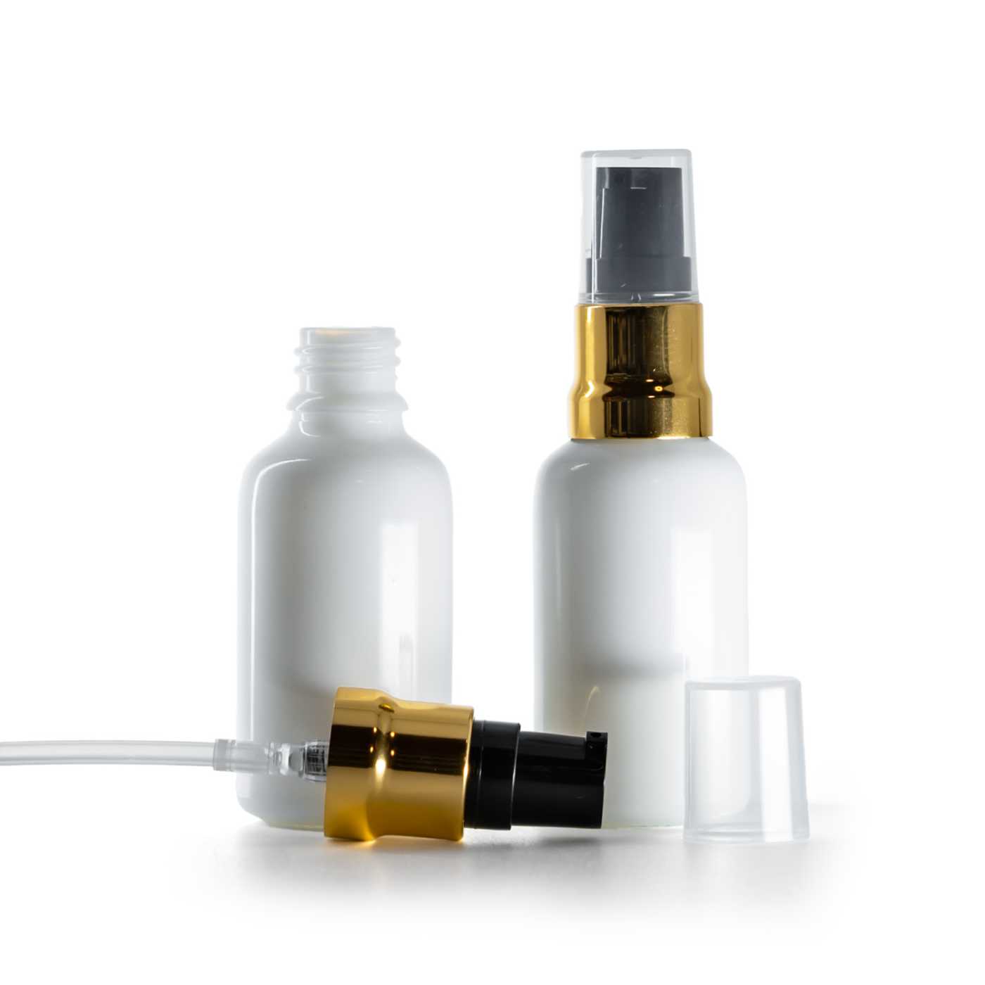 Flacon en verre blanc avec pompe noir et or brillant et capot transparent, 30 ml