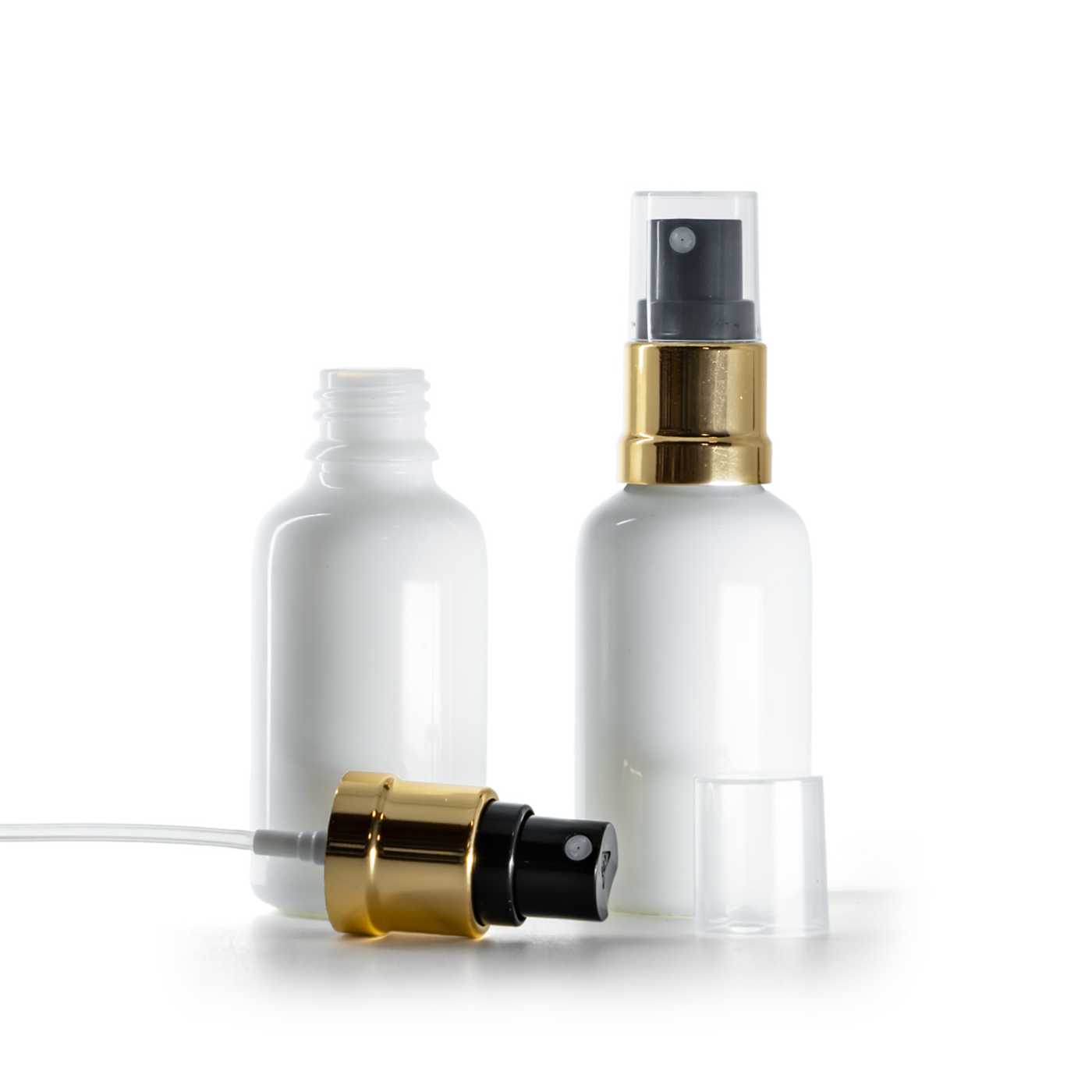 Flacon en verre blanc avec pompe spray noir et or, 30 ml