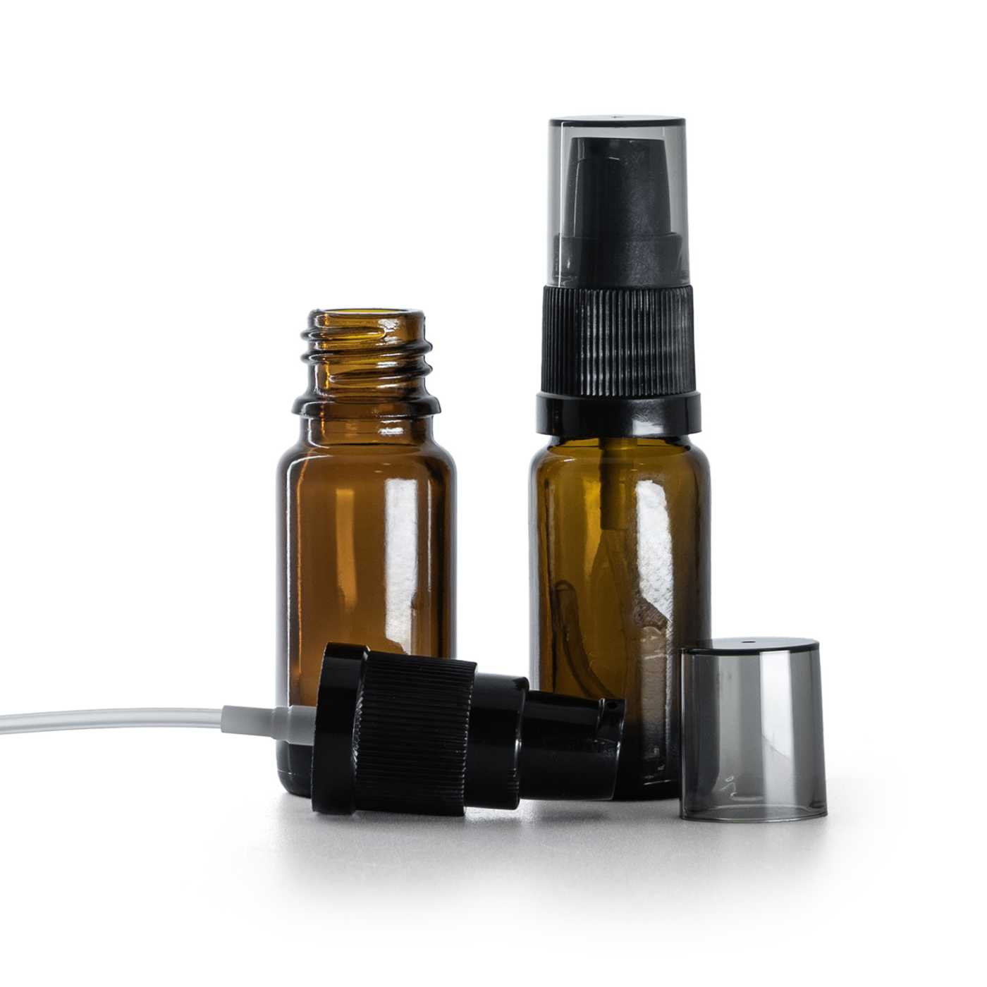 Flacon en verre brun, type B, fin, pompe crème noire avec surcapuchon fumé, 10 ml