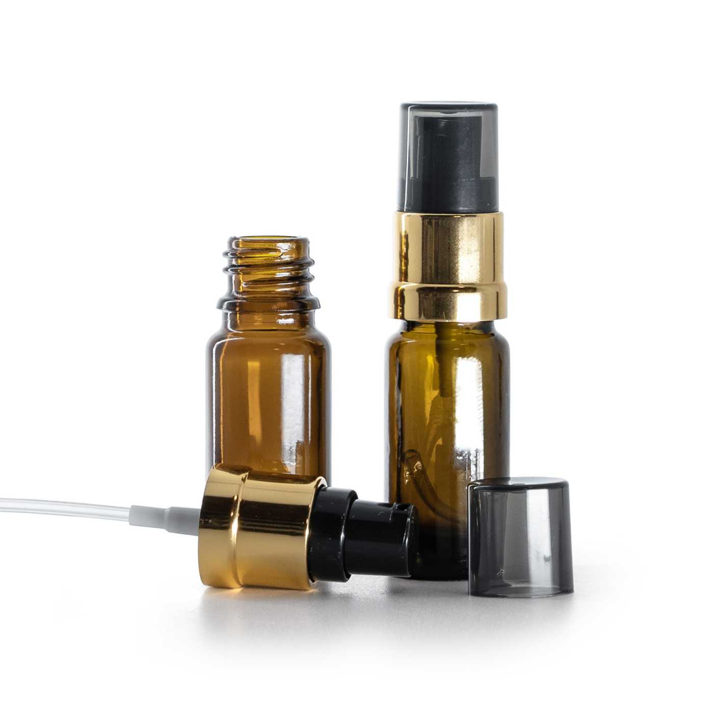 Flacon en verre brun type B, fin, pompe noir et or brillante avec surcapuchon fumé, 10 ml