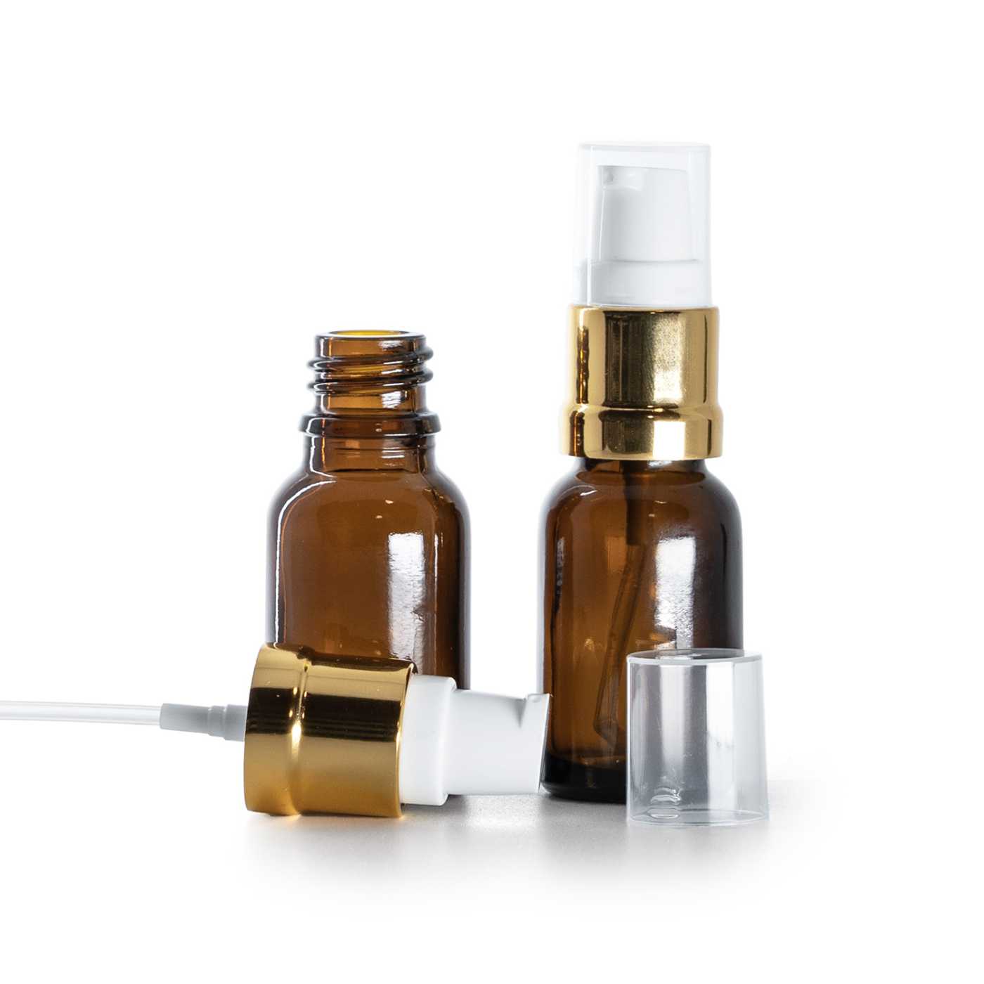 Flacon en verre ambré avec pompe blanche et dorée brillante, 15 ml