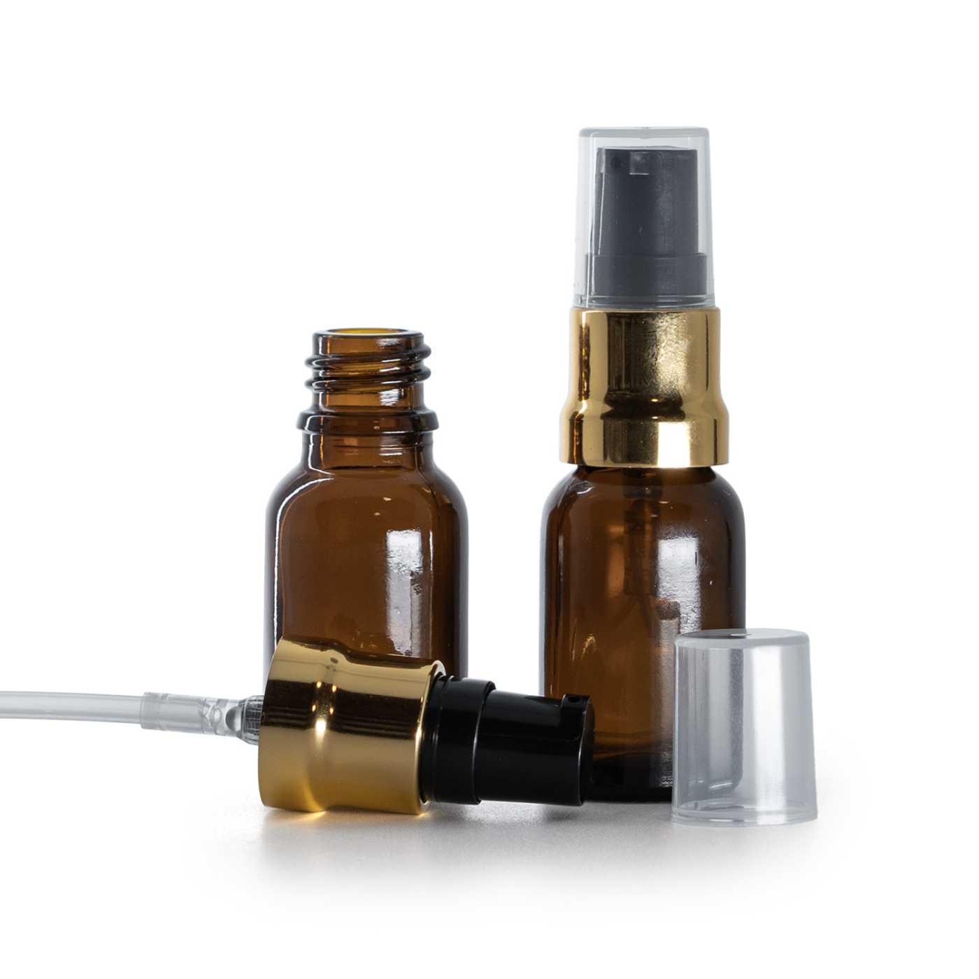 Flacon en verre ambré avec pompe noire et or brillante et capot transparent, 15 ml