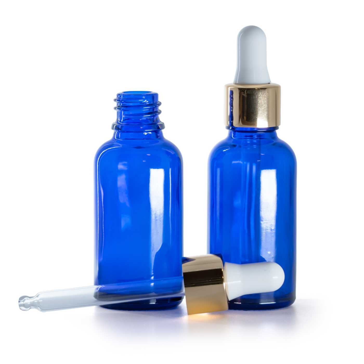 Blaue Glasflasche mit weiß-goldener Pipette, 30 ml