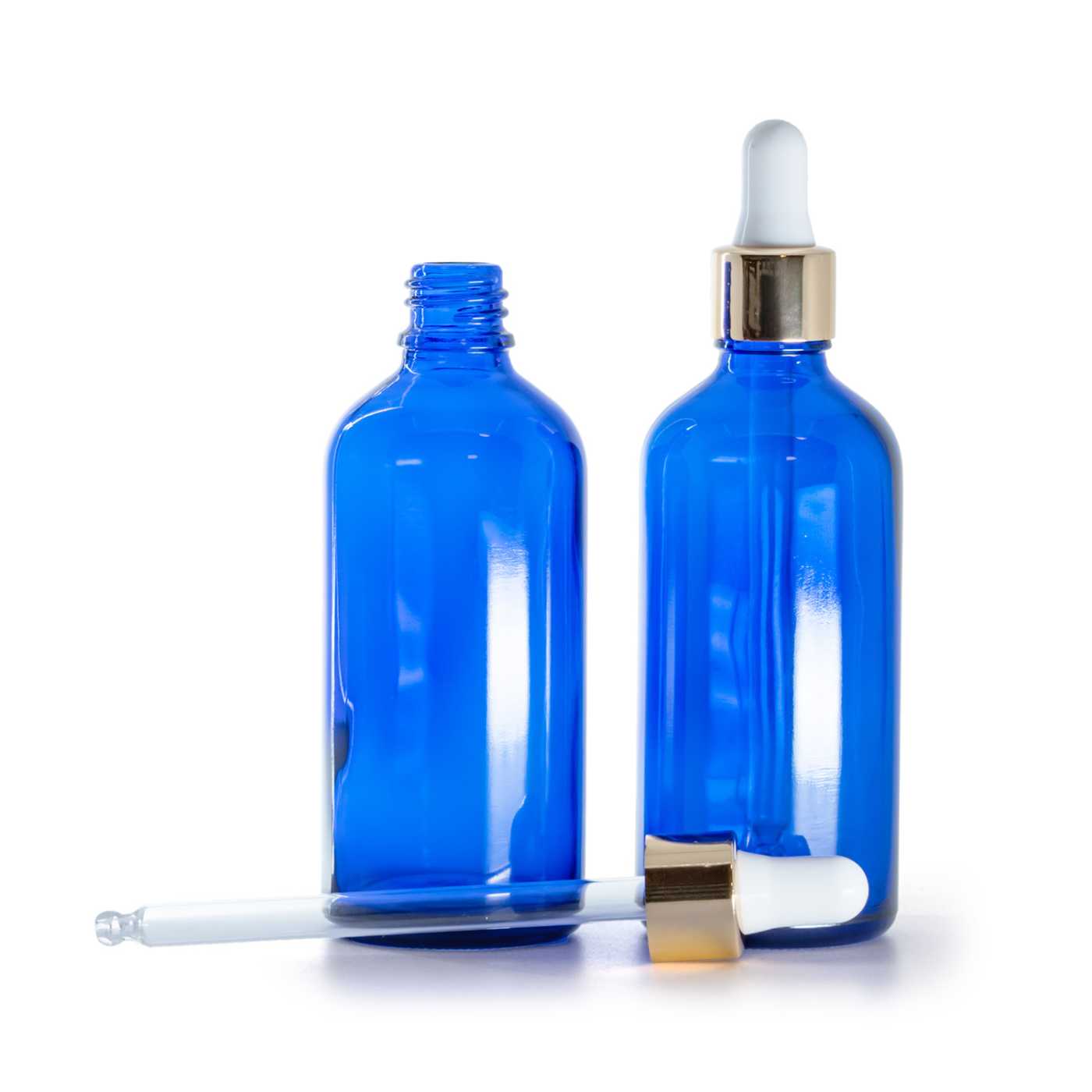 Kék üvegpalack fehér-arany pipettával, 100 ml