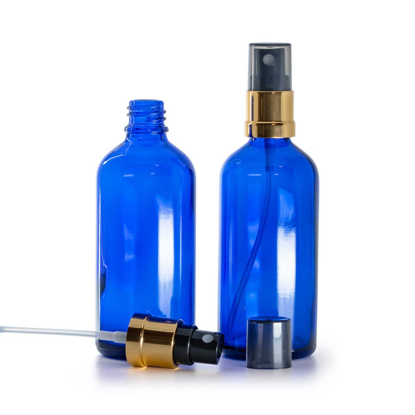 Kék üvegcse, fekete-arany szórófej, füstös felső kupak, 100 ml