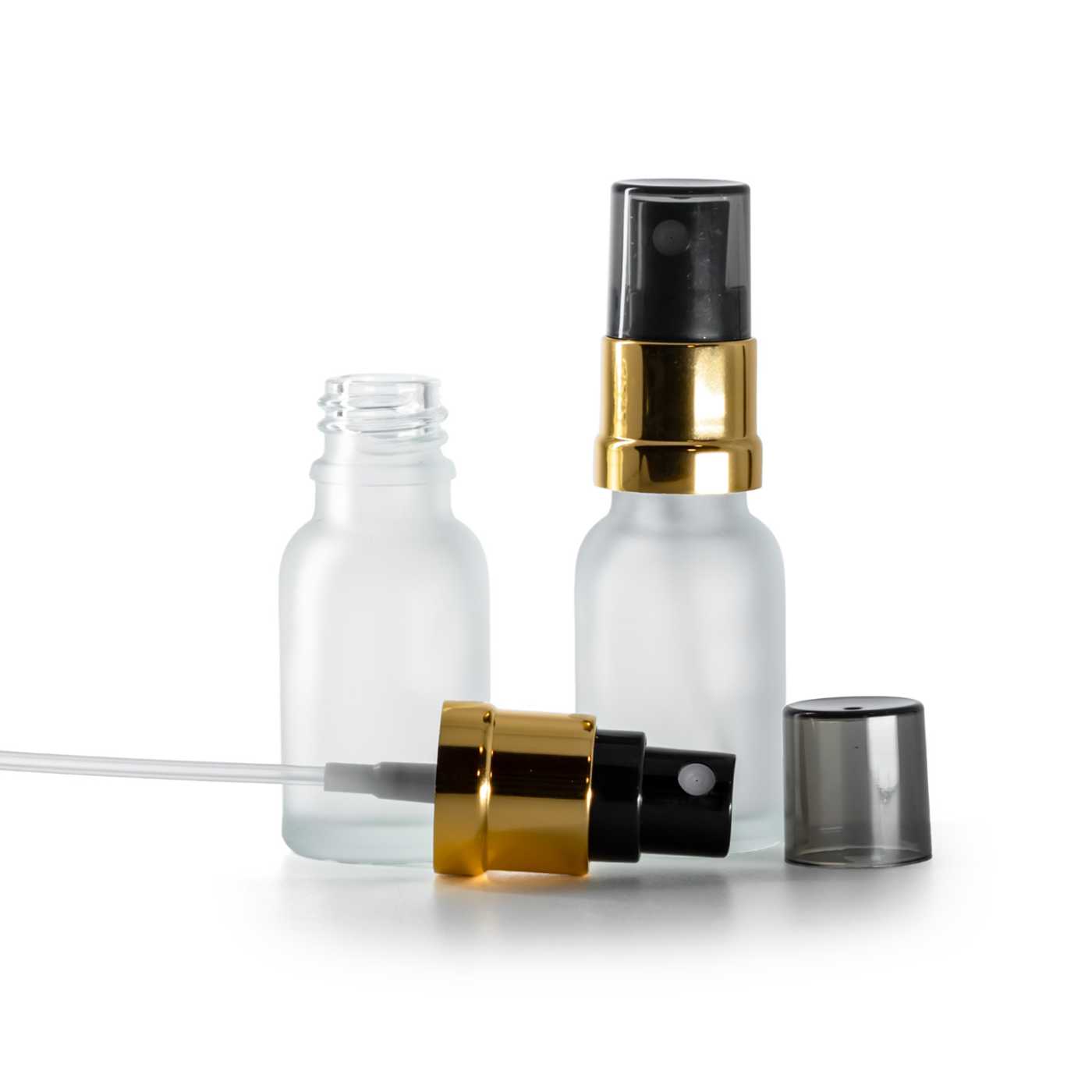 Butelka szklana, przezroczysta mleczna, czarno-złoty atomizer, przydymiony kapturek, 15 ml