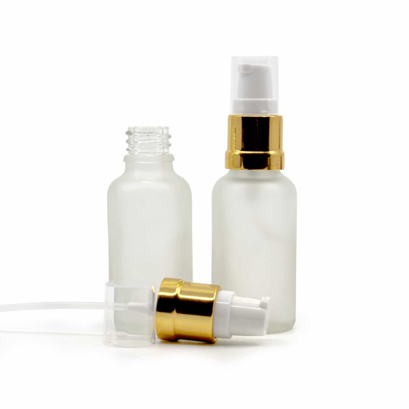 Tejszerű átlátszó üvegpalack, fényes fehér‑arany adagoló, 30 ml
