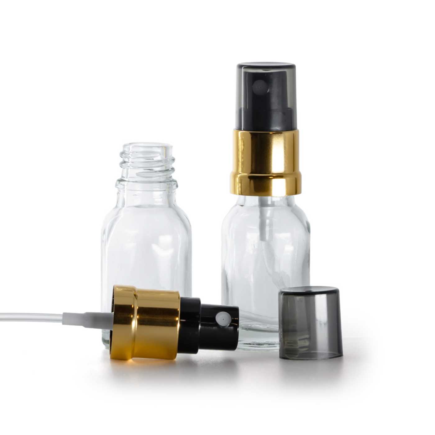 Butelka szklana, przezroczysta, czarno-złoty atomizer, przydymiony kapturek, 15 ml