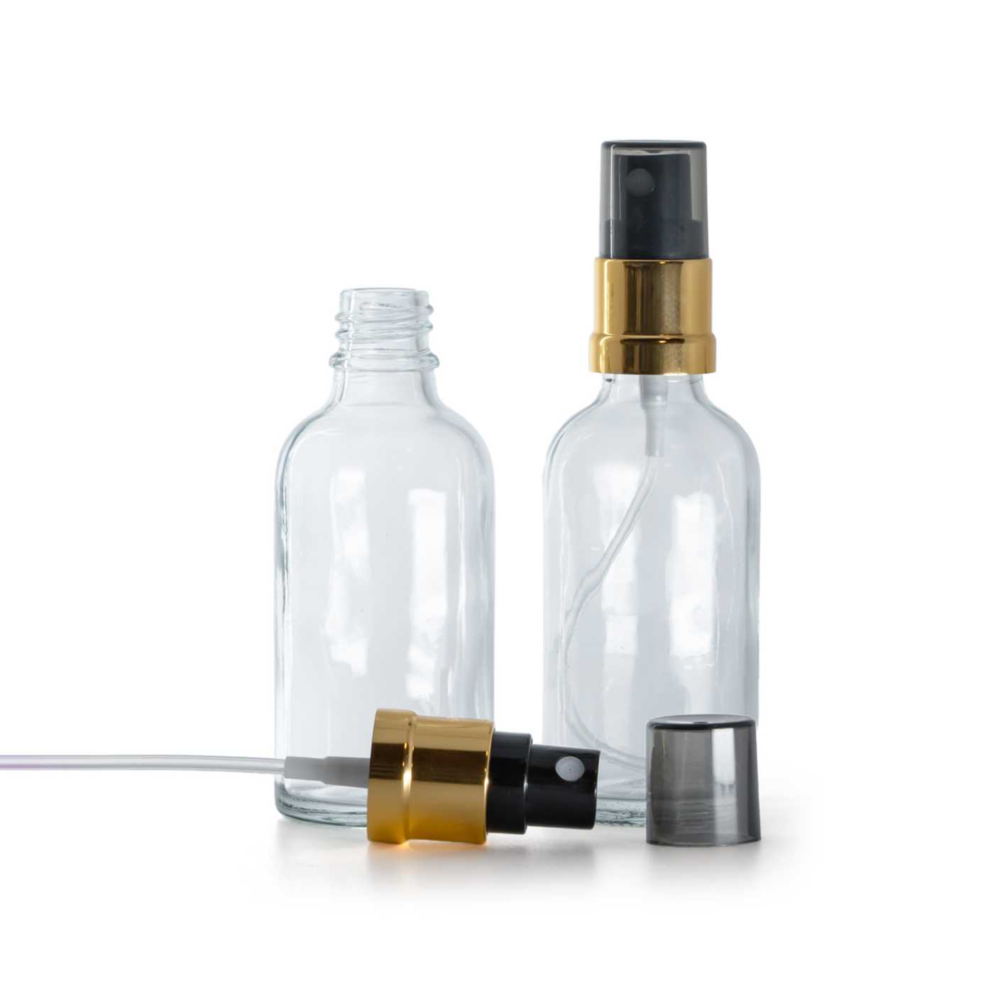 Butelka szklana, przezroczysta, czarno-złoty atomizer, przydymiony kapturek, 30 ml
