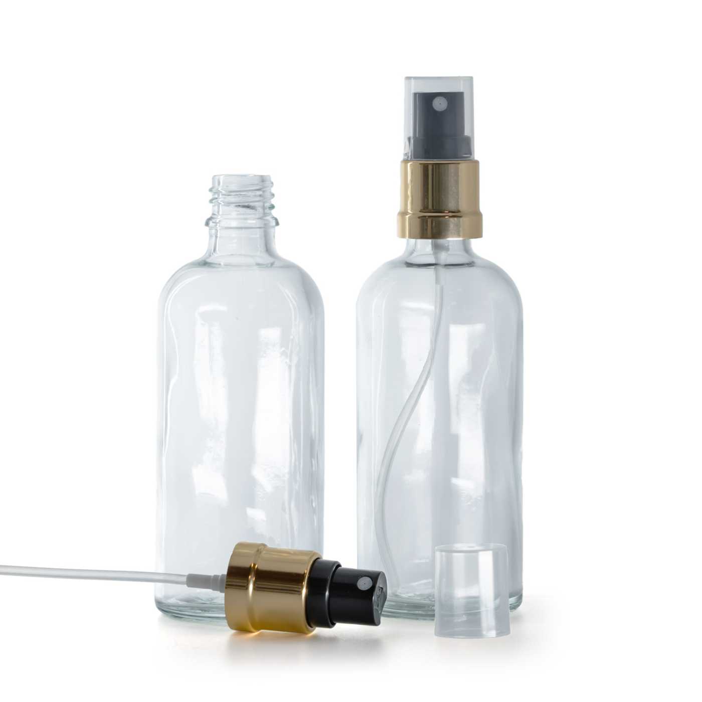 Flacon en verre transparent avec pulvérisateur noir et or, 100 ml