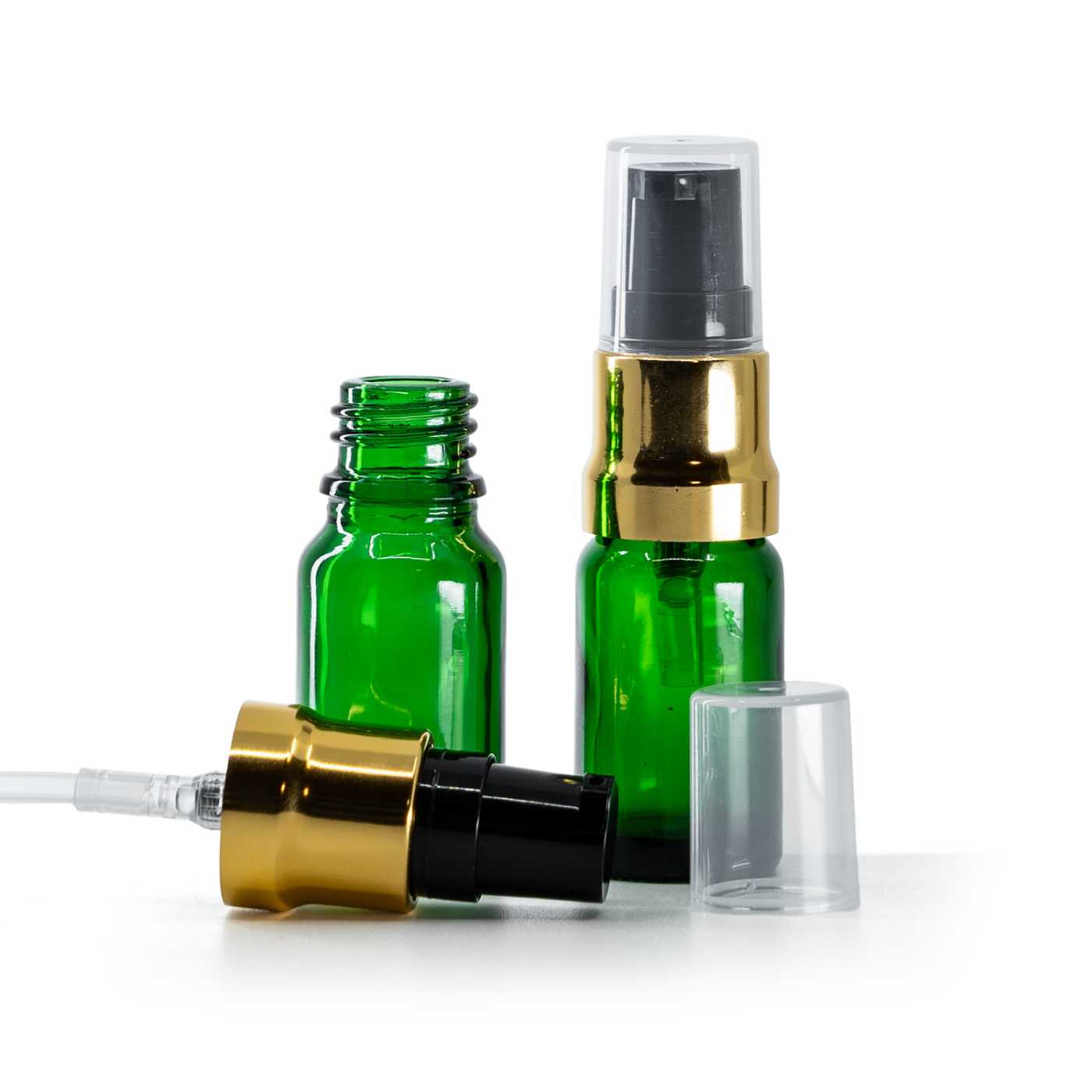Zöld üvegpalack, fényes fekete-arany adagoló átlátszó kupakkal, 10 ml