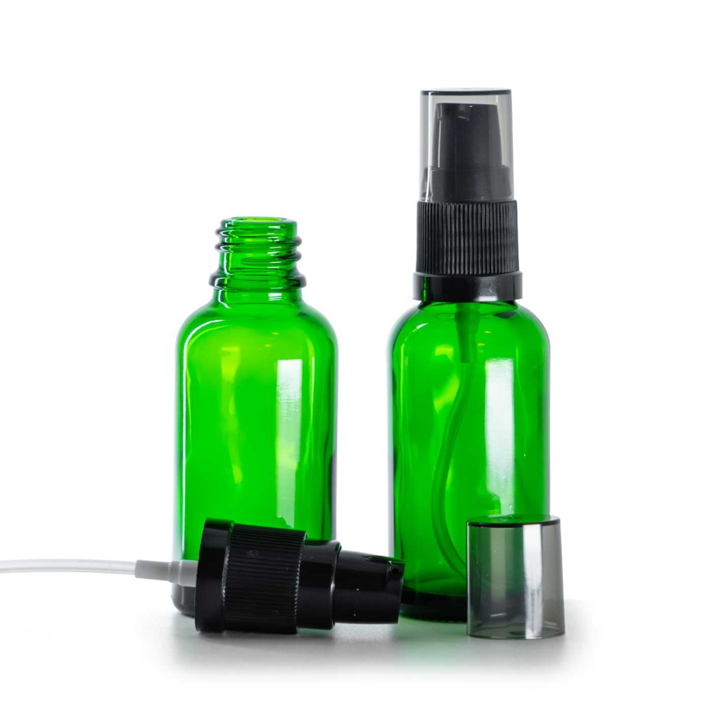 Flacon en verre vert, pompe lotion avec surcapuchon fumé, 30 ml