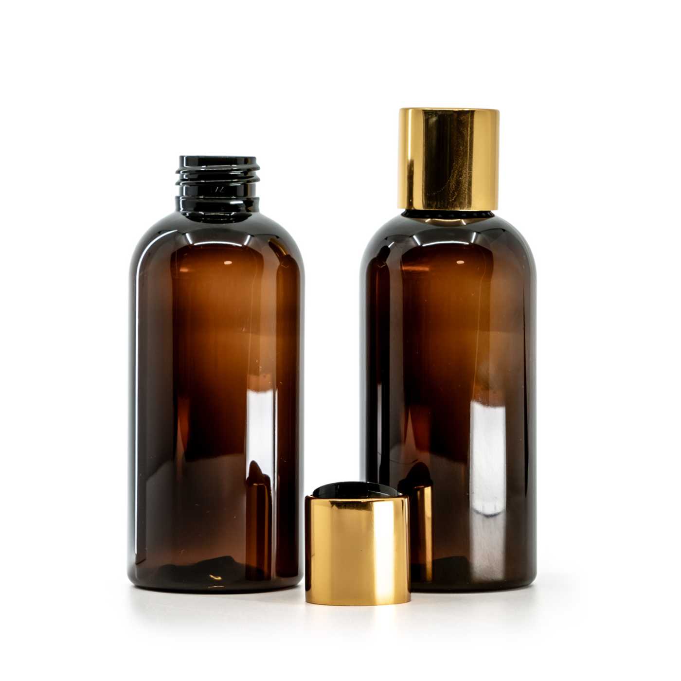 Kunststoffflasche braun, goldener Disc-Top-Verschluss mit schwarzer Mitte, 150 ml