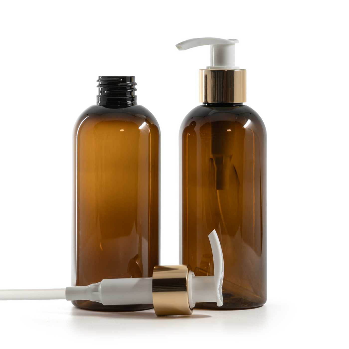 Bouteille en plastique brune, pompe lotion blanche avec bague dorée brillante, 200 ml