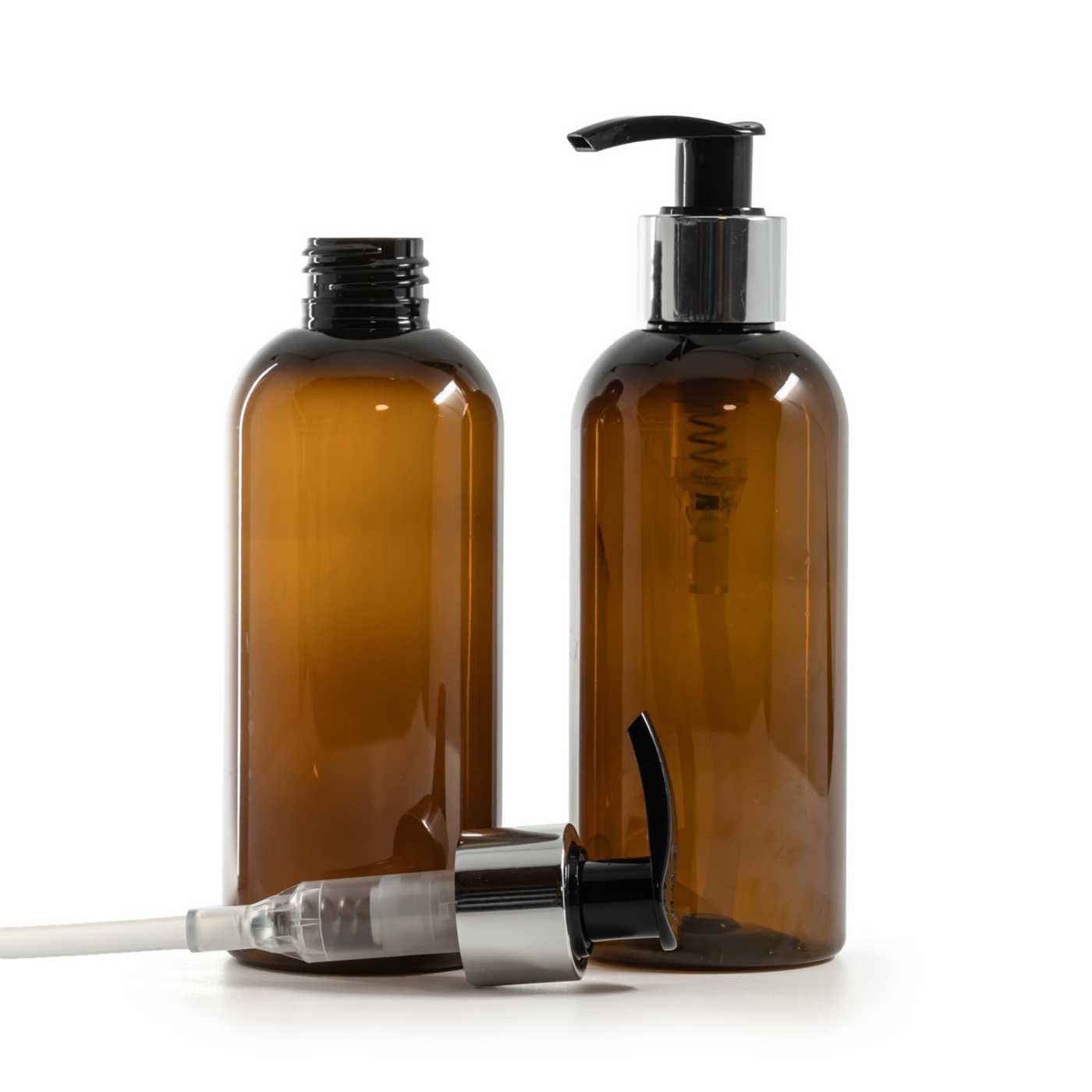 Flacon en plastique brun, pompe lotion noire avec bague argentée brillante, 200 ml