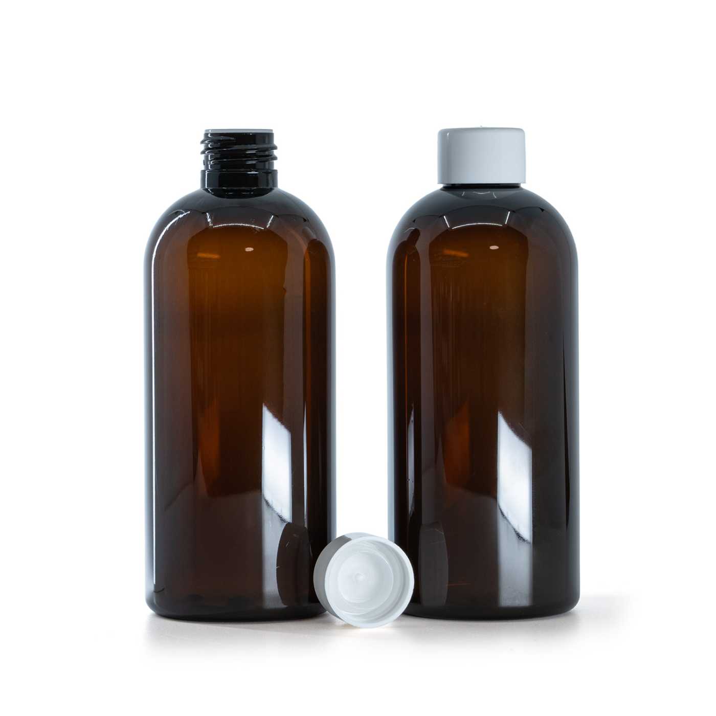 Bouteille en plastique brune, bouchon blanc lisse avec réducteur, 300 ml