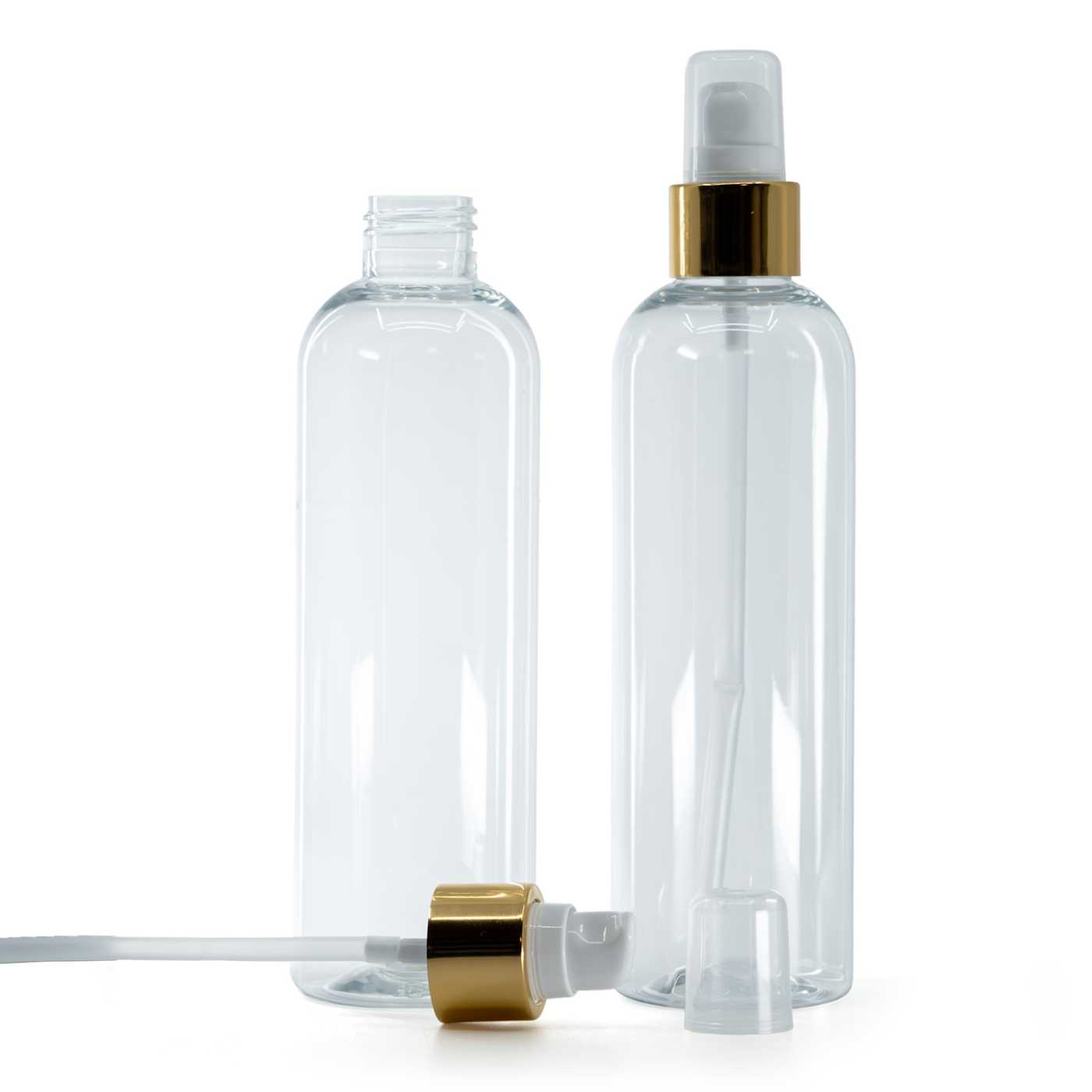 Átlátszó műanyag palack, fehér lotion pumpa fényes arany overcappel, 250 ml