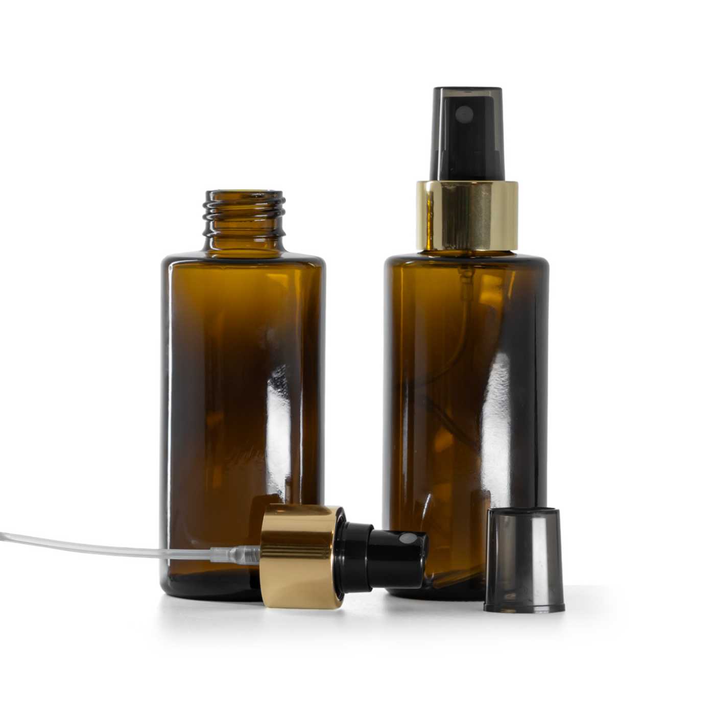 Flacon en verre ambré, col droit, 24 mm, pompe spray noire avec bague dorée brillante, 100 ml